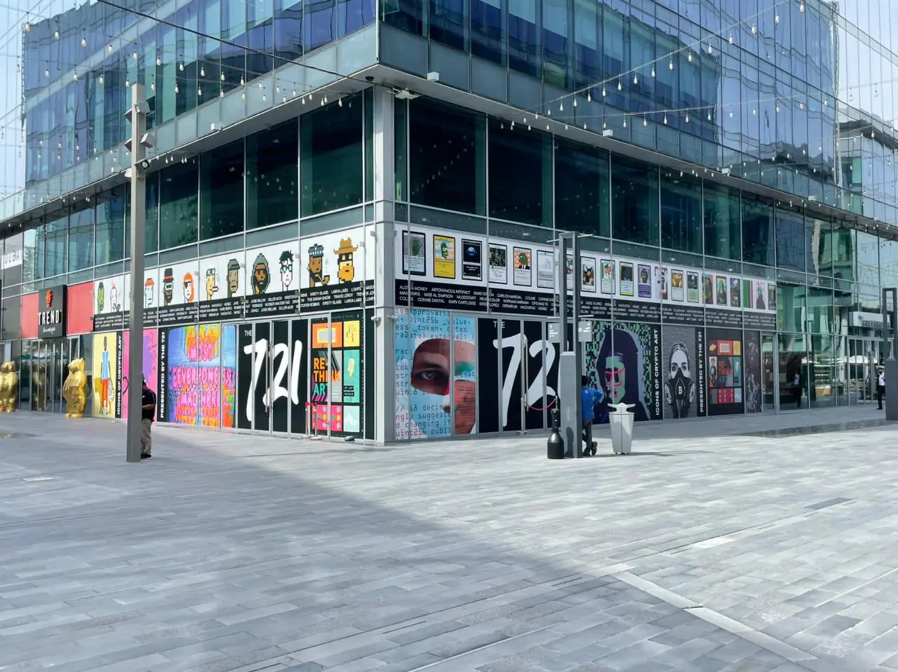 A building in Dubai Design District wrapped in exhibition graphics